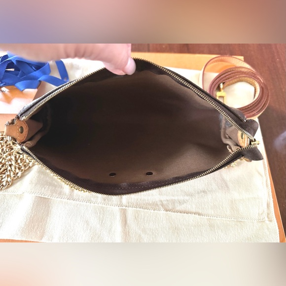 Louis Vuitton Eva 2-way Monogram Clutch/Crossbody
Comes w/ everything Almost new - Picture 11 of 16